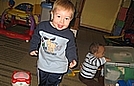 Jimmy's dancing to the song on the drum