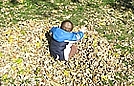 Ricky in the leaf pile