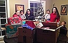 Two other association members helped with the gift delivery