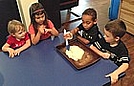 Brushing oil on the bread dough