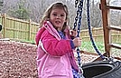 Savannah on the tire swing