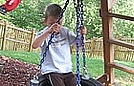 Logan on the tire swing