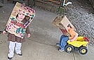 Playing outside with their big hats