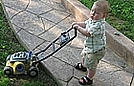 Waving from his swing