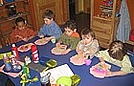 Using puffy paint to ice their muffins