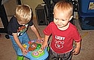 Shane and Levi are playing with the activity table