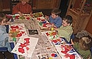 Finger painting on christmas shapes