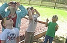 Using their goggles to look for nature items