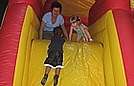 Corin, Oma and Alaina on the slide