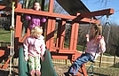 Having fun on the playset