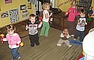 Dancing and playing instruments to The Wiggles