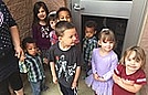 Getting ready to go to Corin's preschool graduation